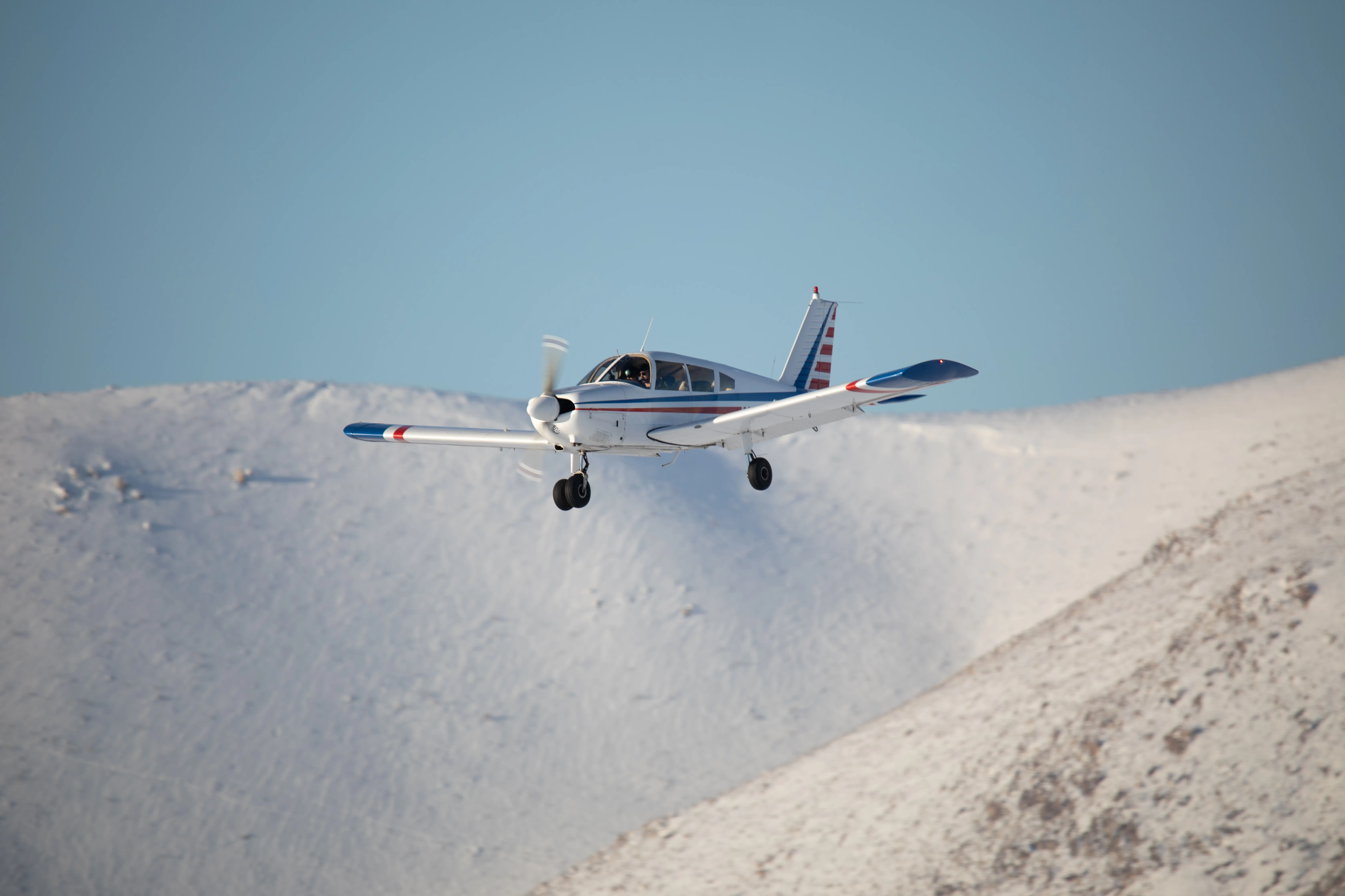 Plane flying over mountains