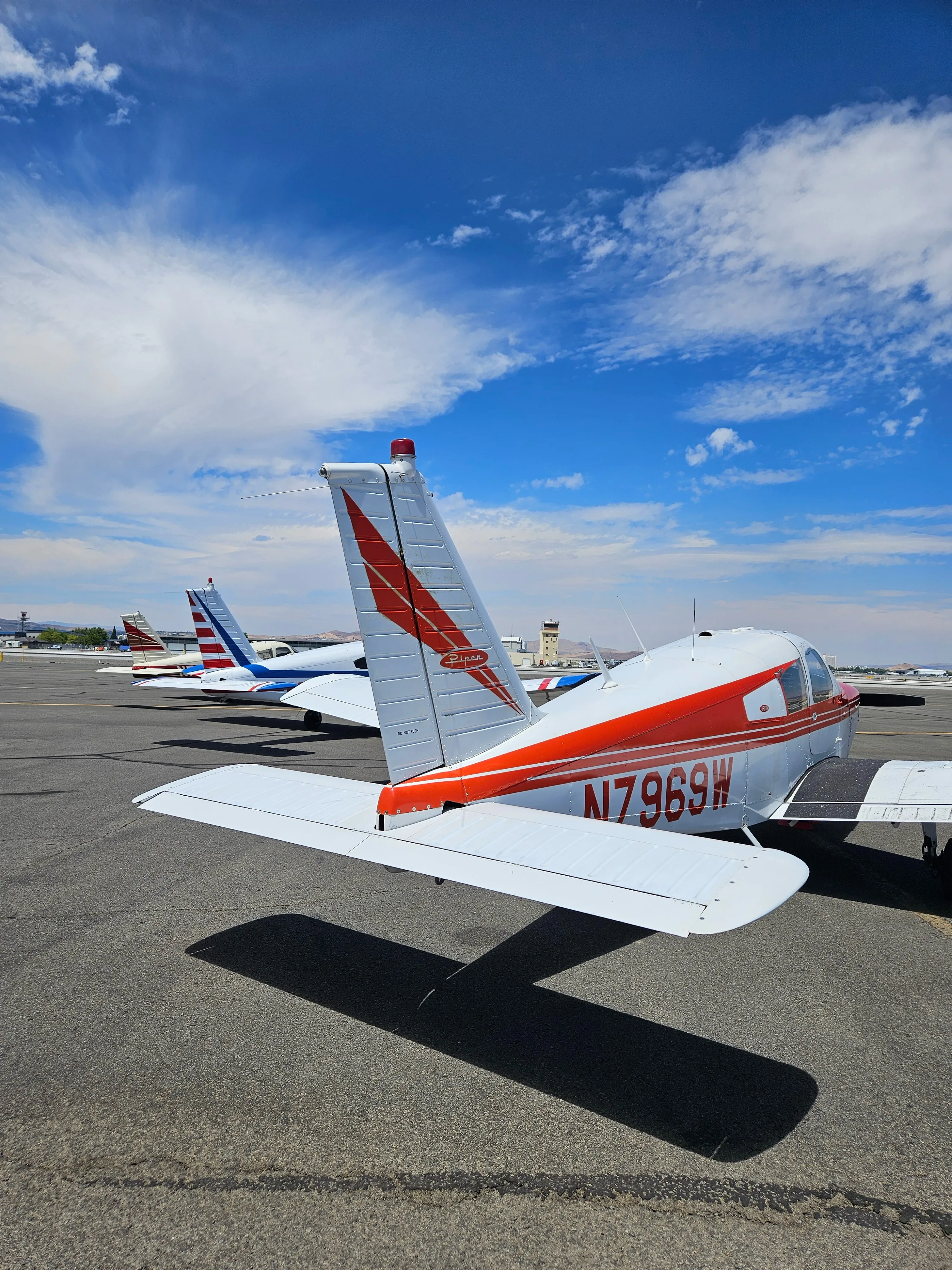 Piper Cherokee 180 N7969W on the runway