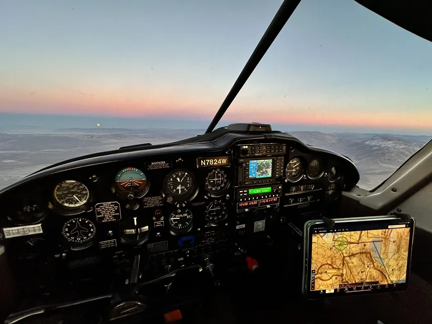 Instructor and student working on instrument approach charts